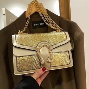 BOLSO COBRA DORADO
